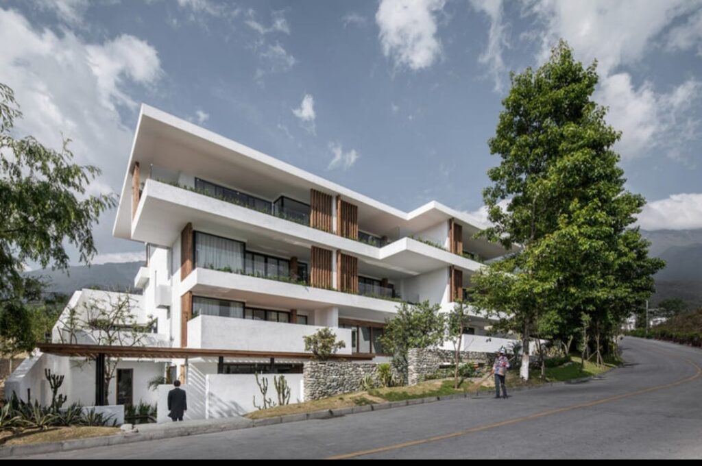 Modern luxury villa building representing stable long-term hospitality investment opportunities.